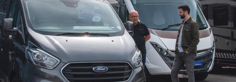 Dealer and customer on forecourt