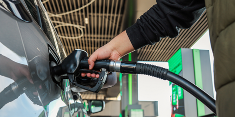Driver filling up the car with fuel - desktop